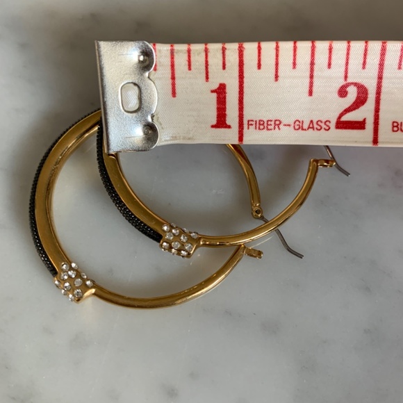 Sparkly 1 3/4 inch hoops in gold-tone with black metal & crystals. - Picture 5 of 9